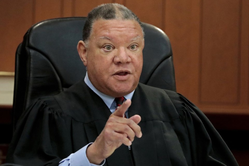 Boston Municipal Court Judge Mark Summerville addresses the court room, while holding an U.S. Immigration and Customs Enforcement agent in contempt after he detained a suspect while he was on trial, Monday, March 31, 2025, in Boston. (Pat Greenhouse/The Boston Globe via AP)